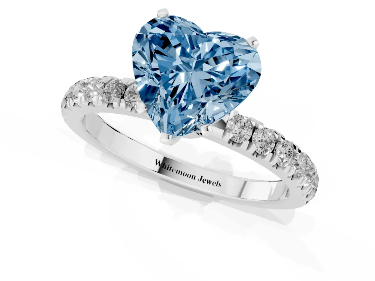 Fancy Blue Heart Cut Diamond Solitaire Ring with Pavé Accents and Four-Prong Setting Silver