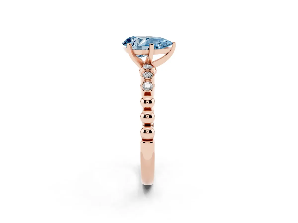 Fancy Blue Pear Cut Solitaire Bezel Accent Diamond Engagement Ring with Beaded Band and Four-Prong Setting Rose gold