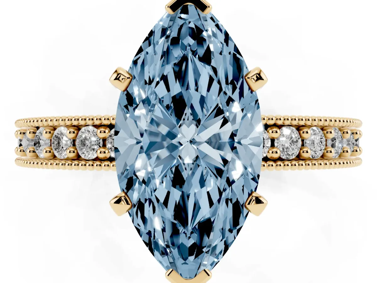 Fancy Blue Marquise Cut Diamond Milgrain Pavé Engagement Ring with Four-Prong Setting Yellow gold