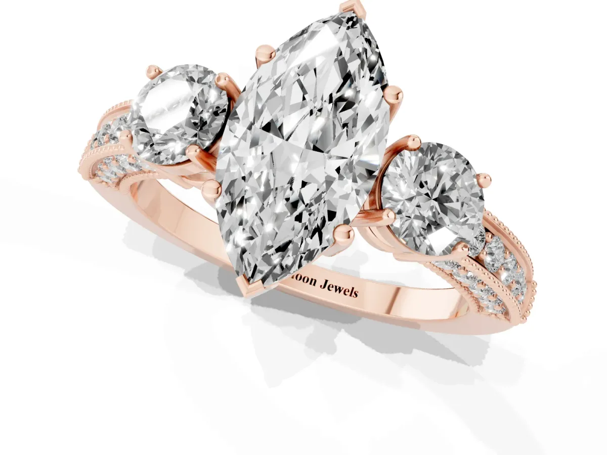 Marquise Cut Three-Stone Diamond Ring with Pavé Band and Four-Prong Setting Rose gold