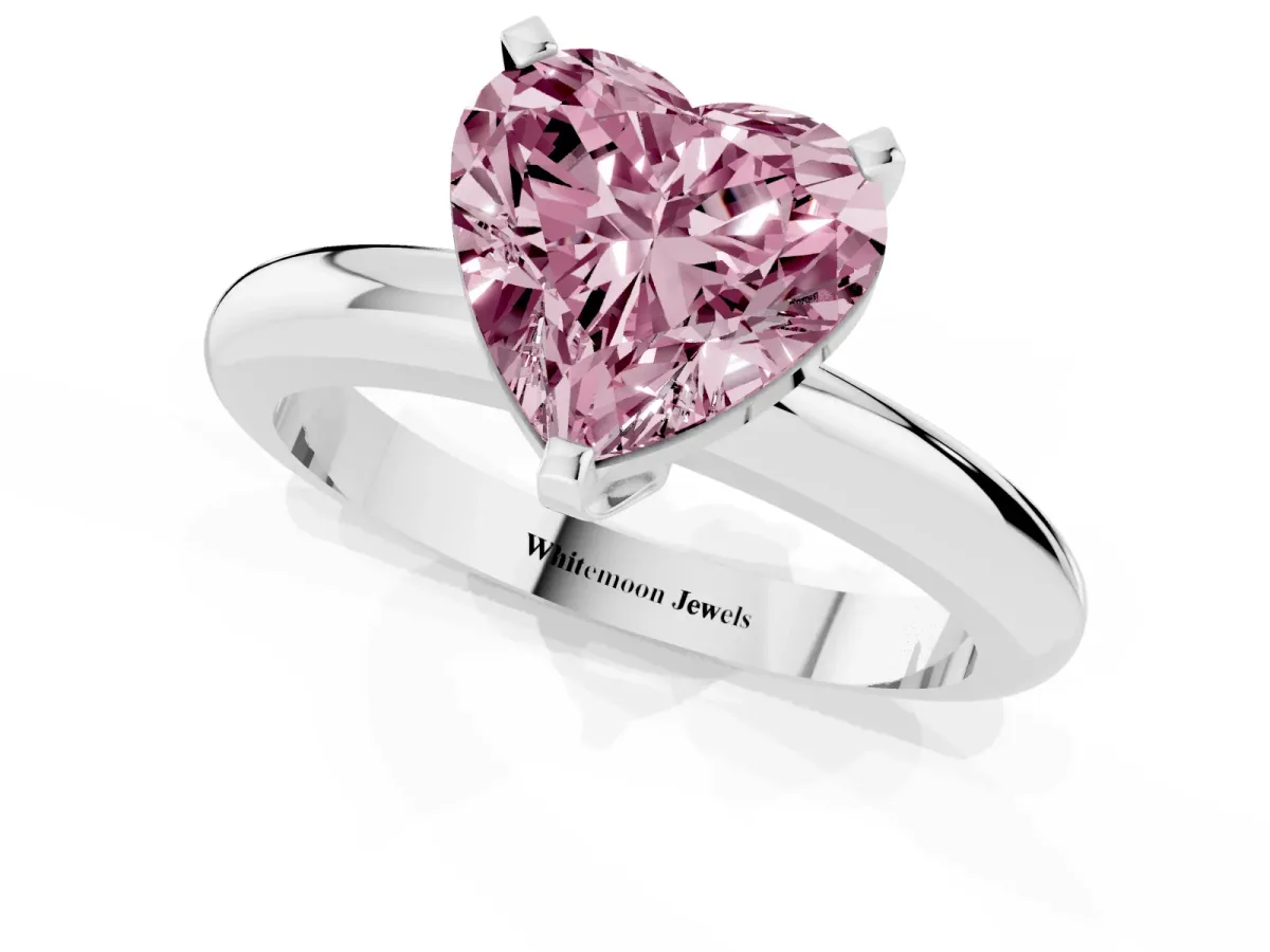 Fancy Pink Heart Cut Diamond Solitaire Engagement Ring with Round Band and Four-Prong Setting Platinum