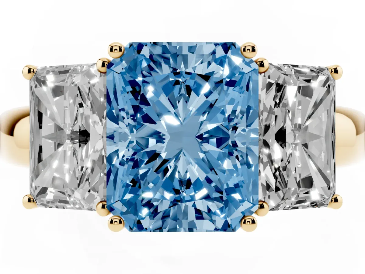 Fancy Blue Radiant Cut Diamond Three-Stone Ring with Four-Prong Setting and Classic Band Yellow gold