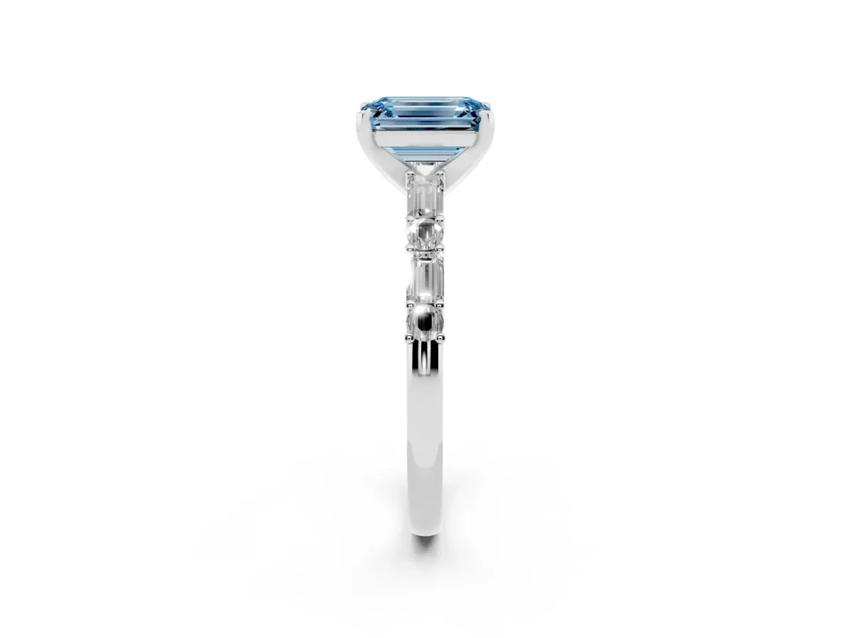 Fancy Blue Emerald Cut Diamond Solitaire with Side Baguettes and Channel Set Band Platinum