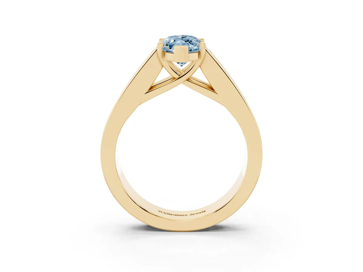 Fancy Blue Marquise Cut Cut Channel Set Solitaire Ring with Four-Prong Setting Yellow gold