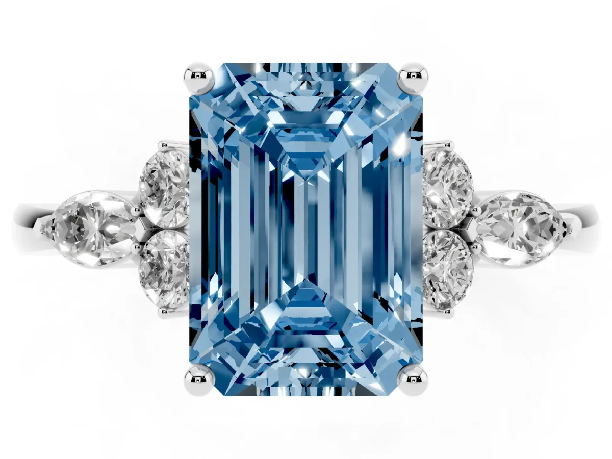 Fancy Blue Emerald Cut Brilliant Diamond Solitaire Ring with Pear Side Stones and Four-Prong Setting Silver