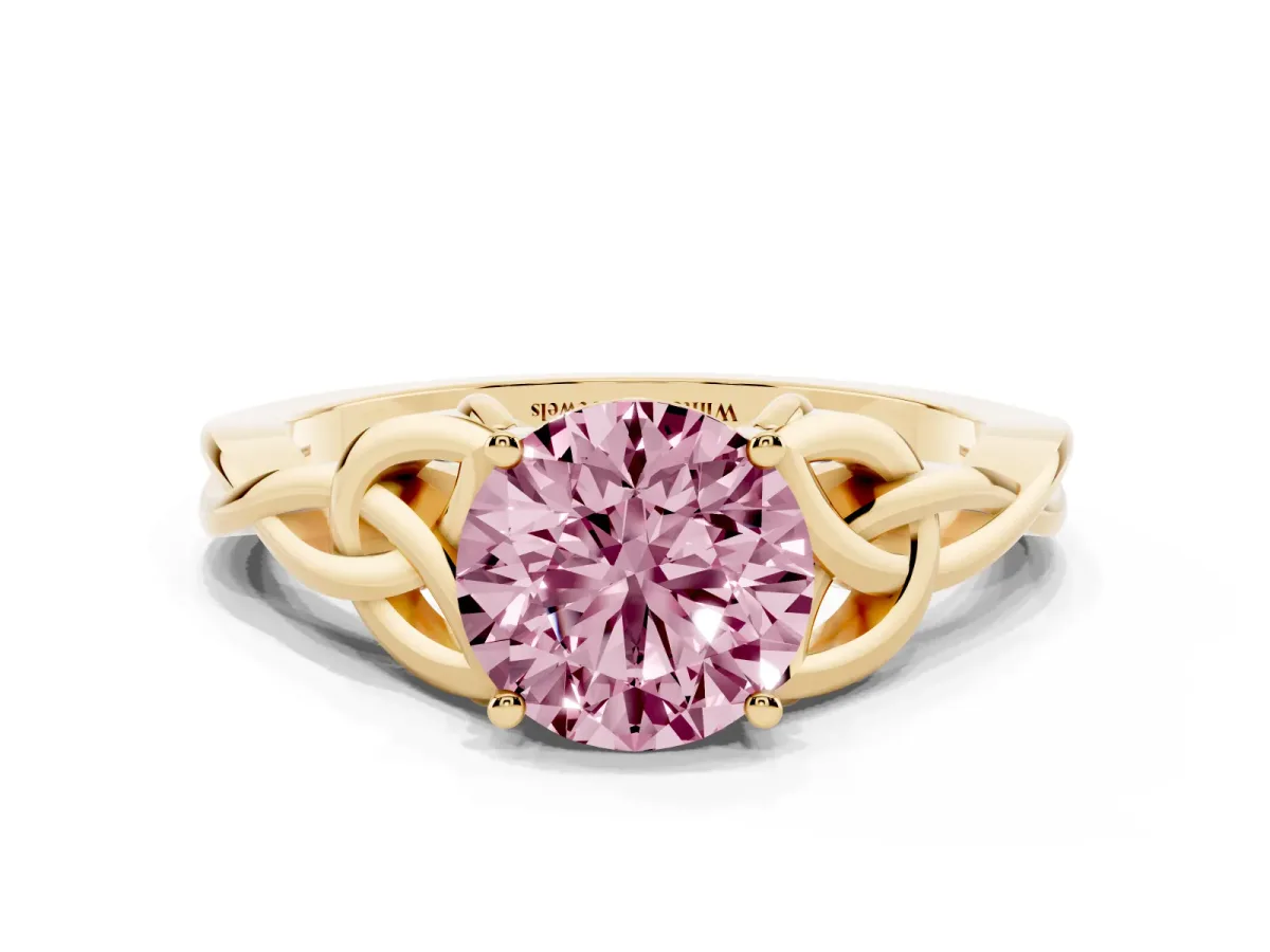 Fancy Pink Round Cut Diamond Solitaire Engagement Ring with Celtic Knot Band and Four-Prong Setting Yellow gold