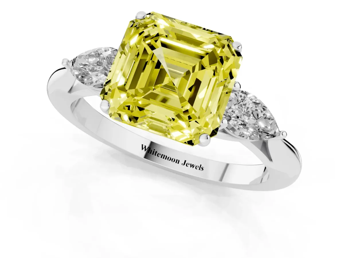 Fancy Yellow Three-Stone Asscher Cut Diamond Ring with Pear Side Stones in Four-Prong Setting Silver
