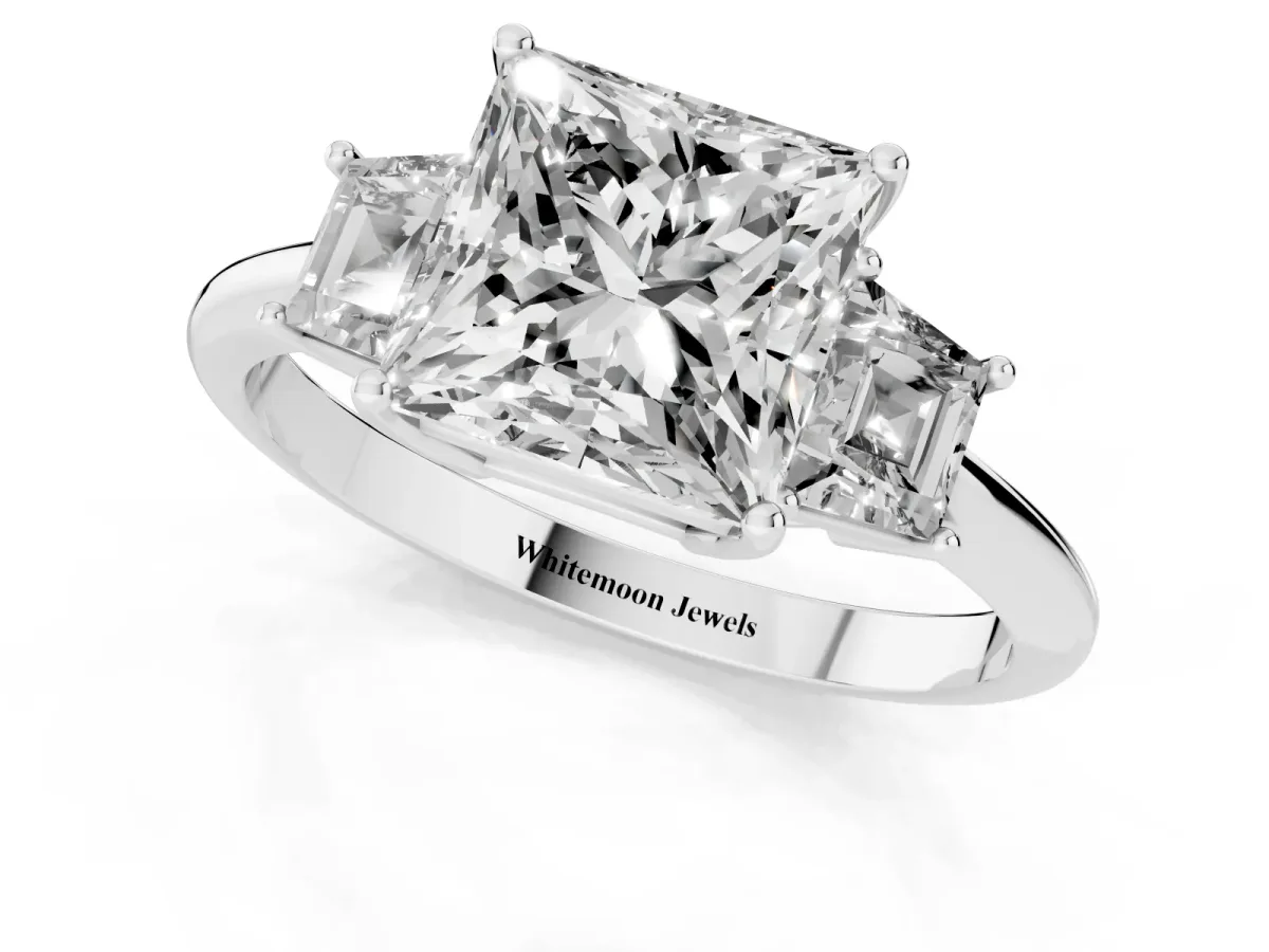 Princess Cut Diamond Three-Stone Ring with Trapezoid Side Stones and Prong Setting Platinum