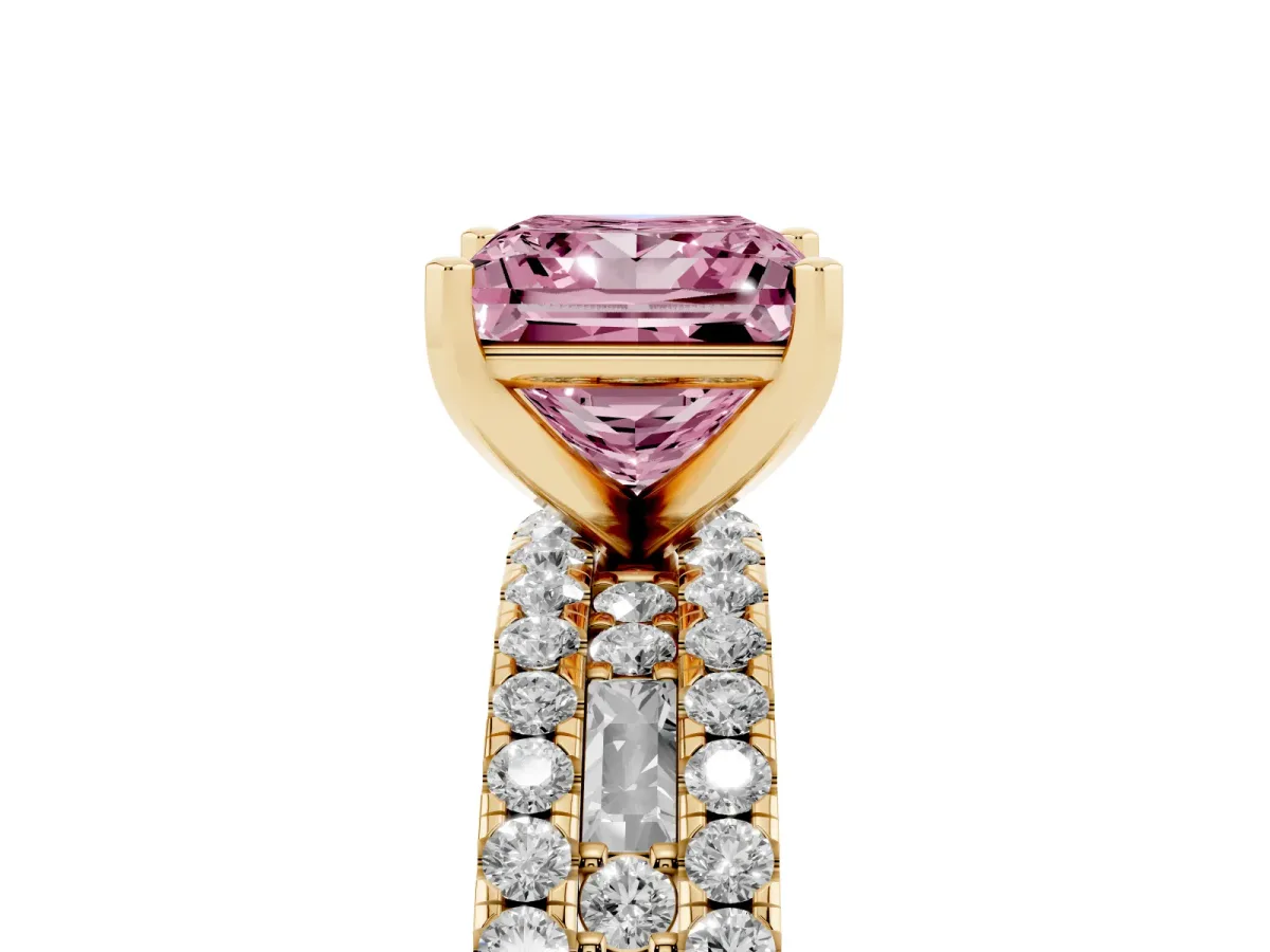 Fancy Pink Princess Cut Diamond Solitaire Ring with Pavé and Channel Set Band Yellow gold