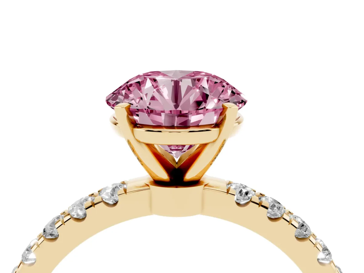 Fancy Pink Round Cut Diamond Solitaire Ring with Pavé Accents and Four-Prong Setting Yellow gold