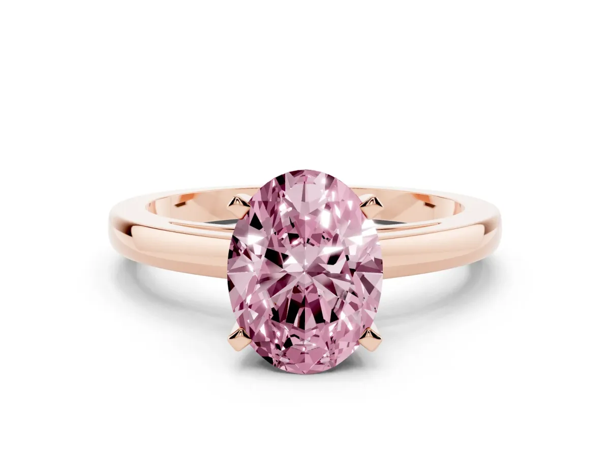 Fancy Pink Oval Cut Solitaire Diamond Engagement Ring with Four-Prong Setting on a Classic Band Rose gold