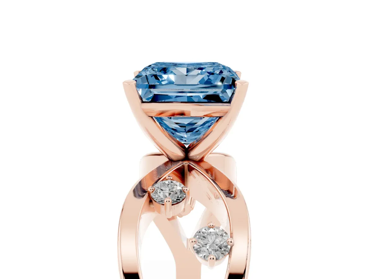 Fancy Blue Princess Cut Cut Solitaire Diamond with Side Stones on Criss-Cross Band and Four-Prong Setting Rose gold