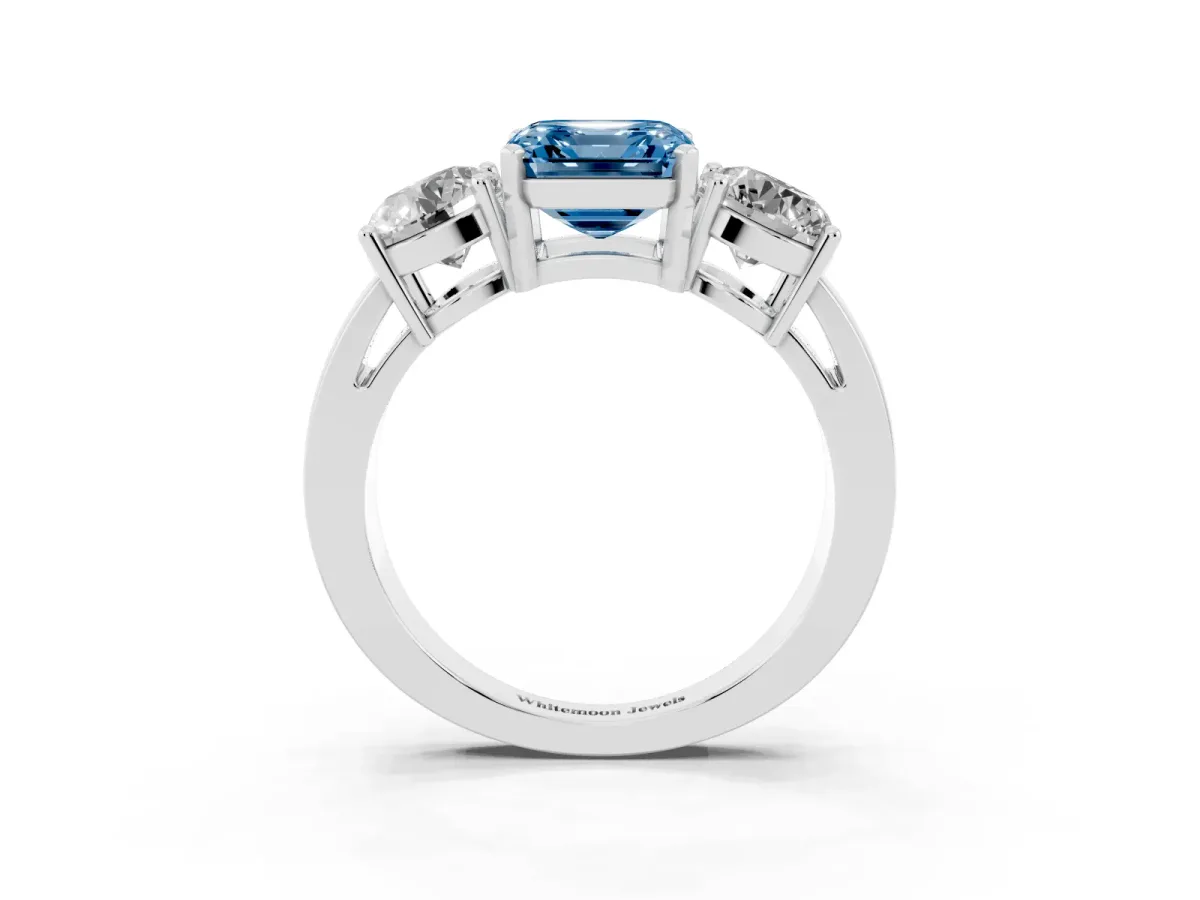 Fancy Blue Three-Stone Asscher Cut Diamond Ring with Round Side Stones, Classic Band, and Four-Prong Setting White gold