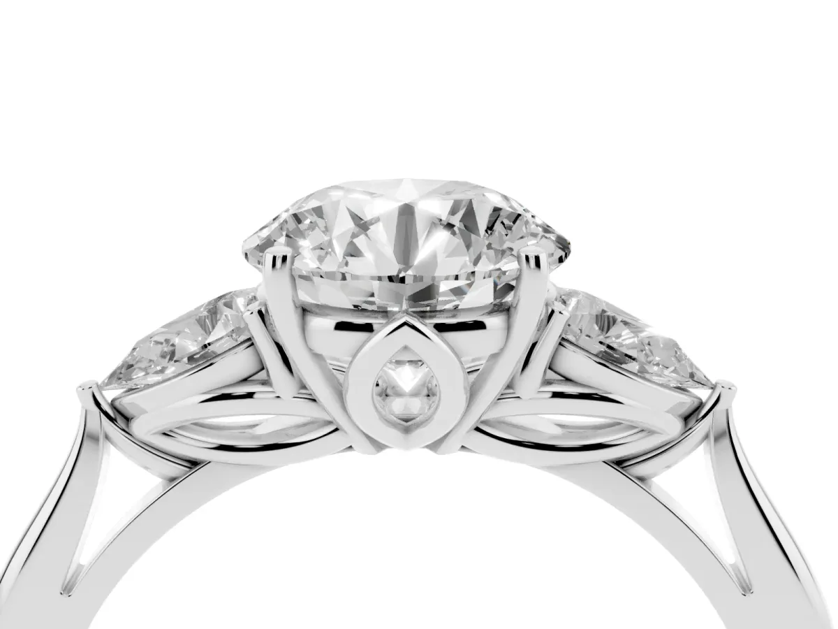 Three-Stone Round Cut Diamond Ring with Pear Side Stones in Four-Prong Setting Silver