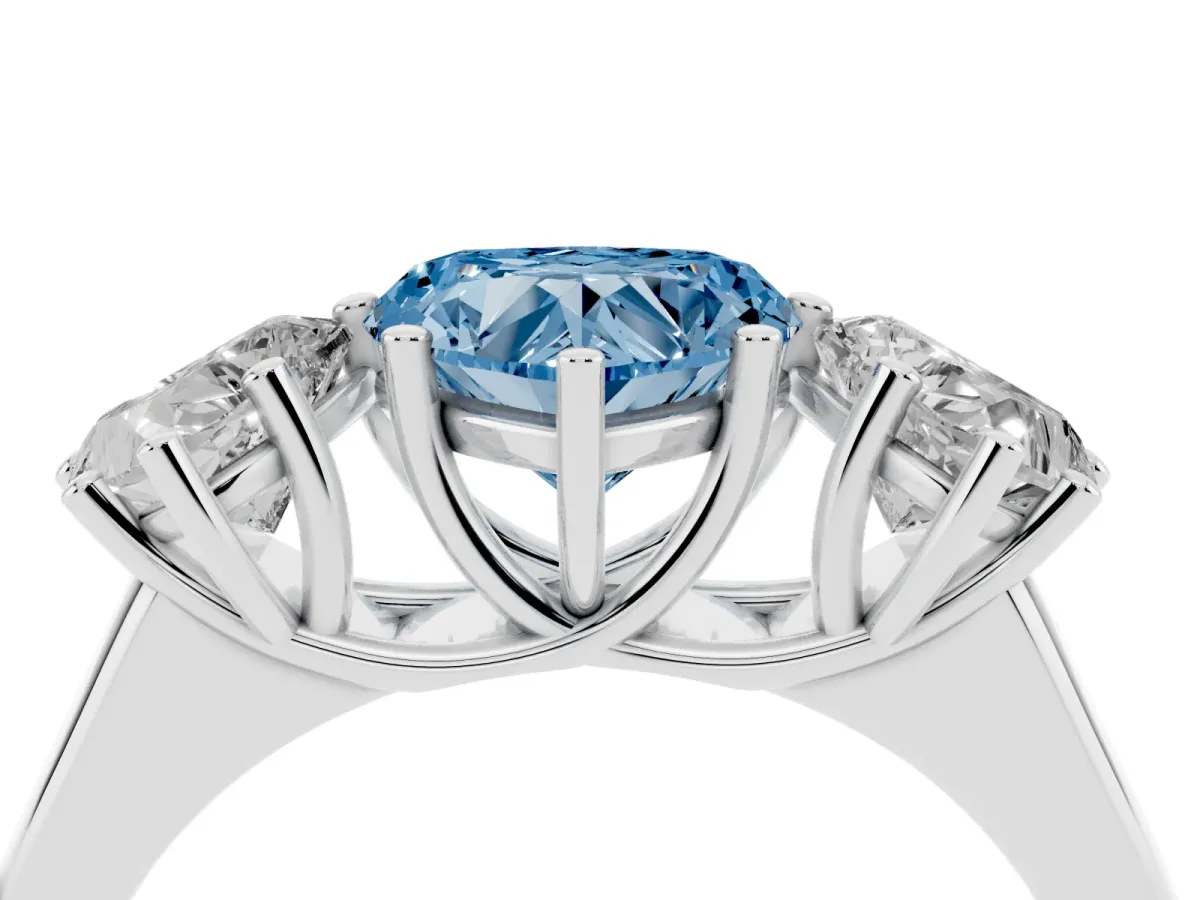 Fancy Blue Heart Cut Three-Stone Diamond Ring with Prong Setting on a Classic Band Platinum