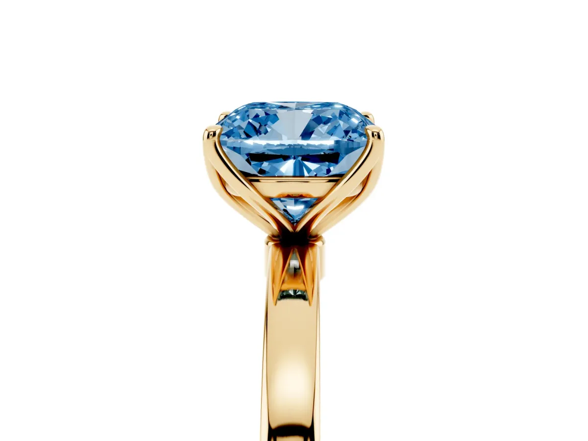 Fancy Blue Cushion Cut Diamond Solitaire Ring with Thin Band and Prong Setting Yellow gold