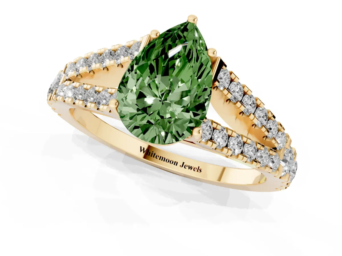 Fancy Green Pear Cut Diamond Split Shank Pavé Engagement Ring with Four-Prong Setting Yellow gold