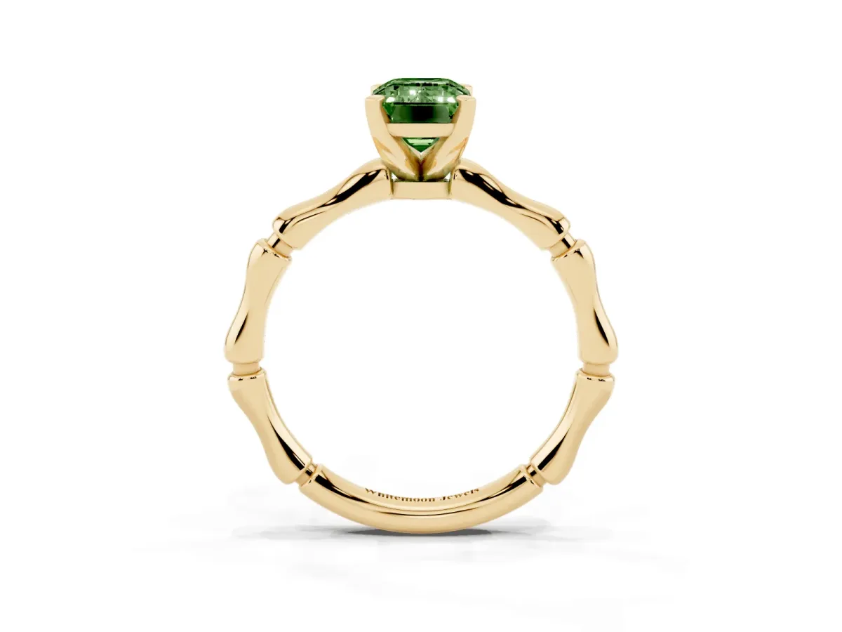 Fancy Green Emerald Cut Solitaire Diamond Ring with Bamboo Band and Four-Prong Setting Yellow gold