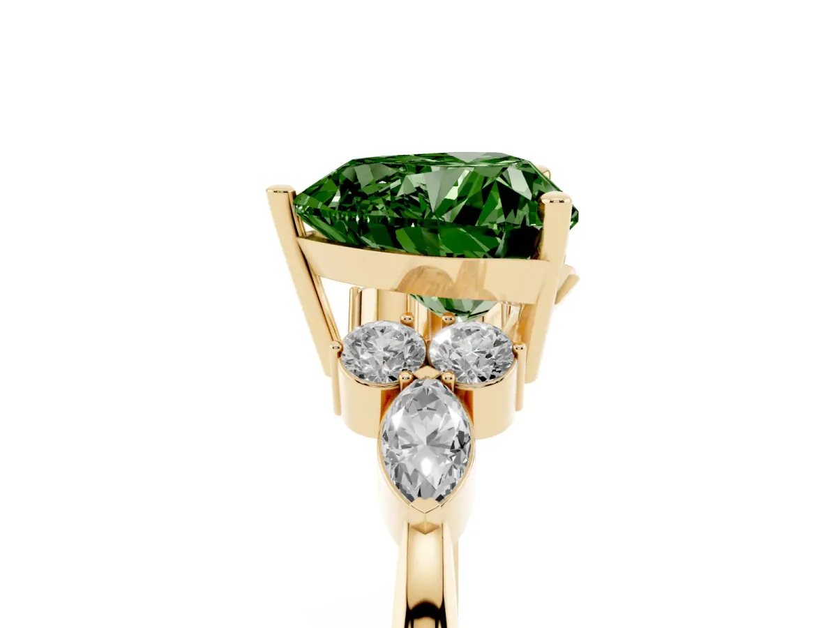 Fancy Green Heart Cut Brilliant Diamond Solitaire Ring with Pear Side Stones and Four-Prong Setting Yellow gold