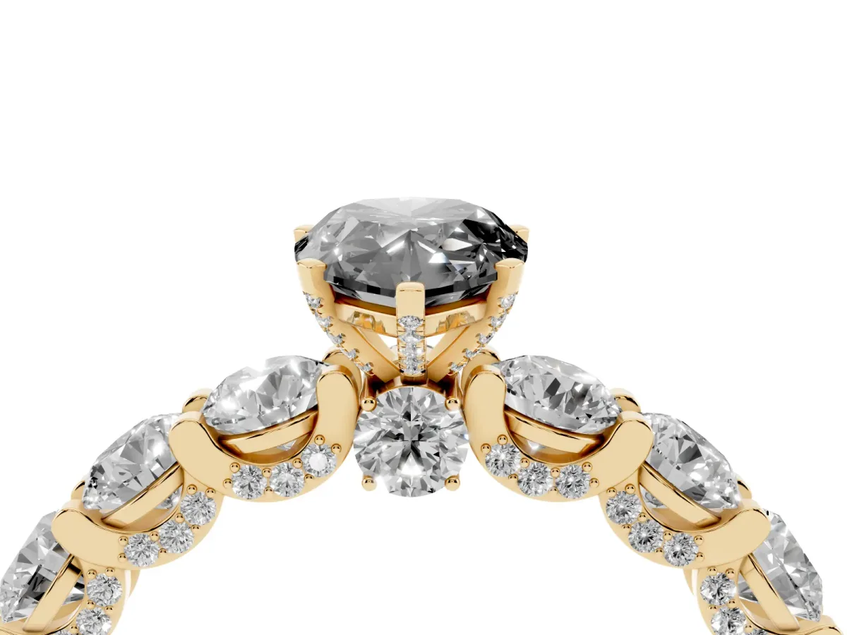 Fancy Black Pear Cut Diamond Side Stone Engagement Ring with Four-Prong Setting Yellow gold