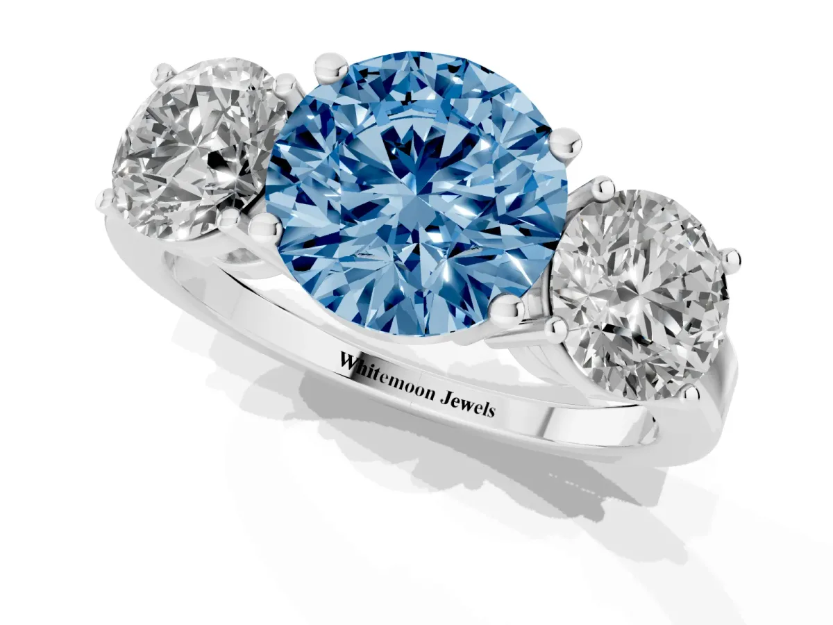 Fancy Blue Three-Stone Round Cut Cut Diamond Engagement Ring with Flat Band and Four-Prong Setting Silver