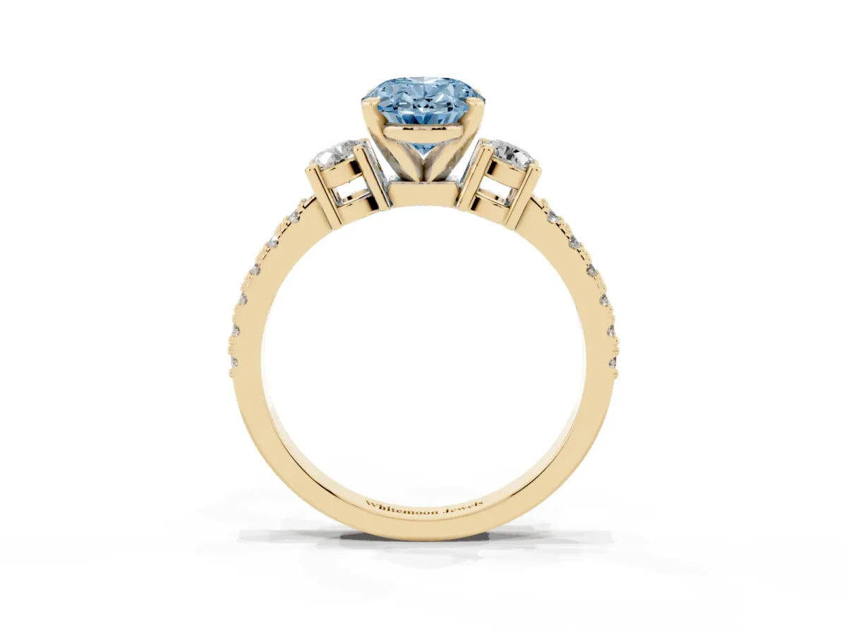 Fancy Blue Oval Cut Three-Stone Diamond Pavé Band with Prong Setting Yellow gold