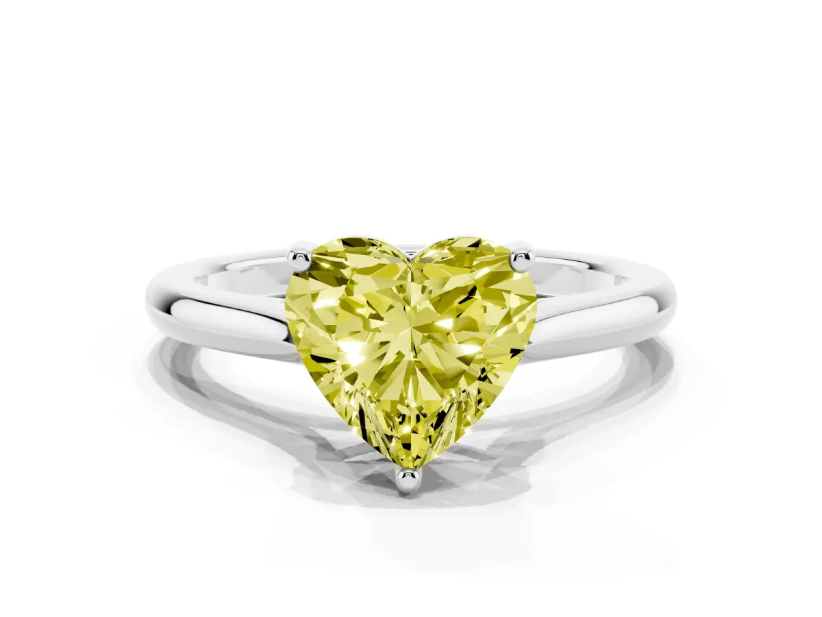 Fancy Yellow Heart Cut Cut Solitaire Ring with Cathedral Band and Four-Prong Setting Silver
