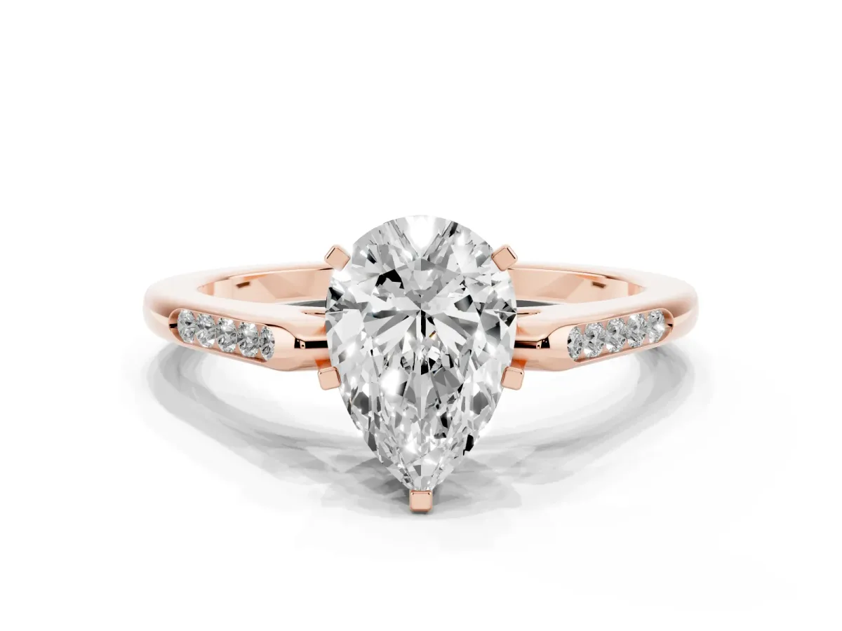 Pear Cut Diamond Solitaire Ring with Channel Set Round Band and Prong Setting Rose gold