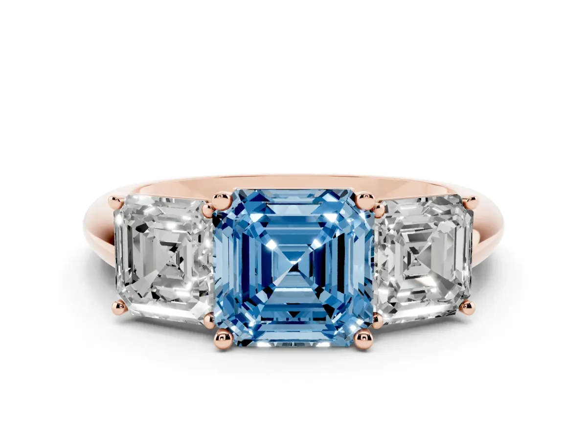 Fancy Blue Three-Stone Asscher Cut Cut Diamond Engagement Ring with Prong Setting on a White Gold Band Rose gold