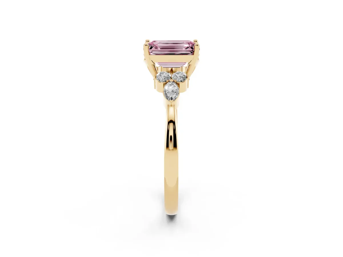 Fancy Pink Emerald Cut Brilliant Diamond Solitaire Ring with Pear Side Stones and Four-Prong Setting Yellow gold