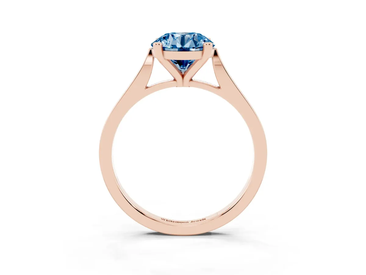 Fancy Blue Round Cut Solitaire Diamond Ring with Four-Prong Setting and Tapered Band Rose gold