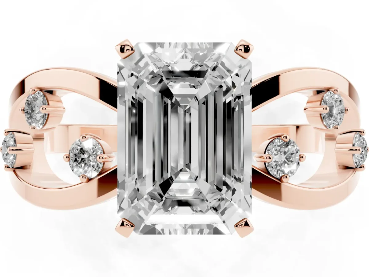 Emerald Cut Cut Solitaire Diamond with Side Stones on Criss-Cross Band and Four-Prong Setting Rose gold