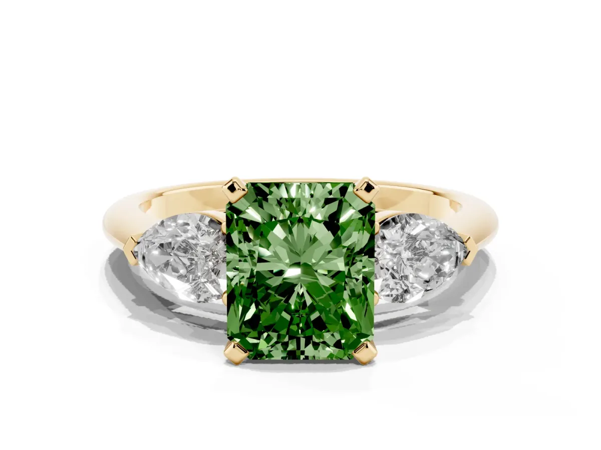 Fancy Green Three-Stone Radiant Cut Diamond Ring with Pear Side Stones and Four-Prong Setting Yellow gold