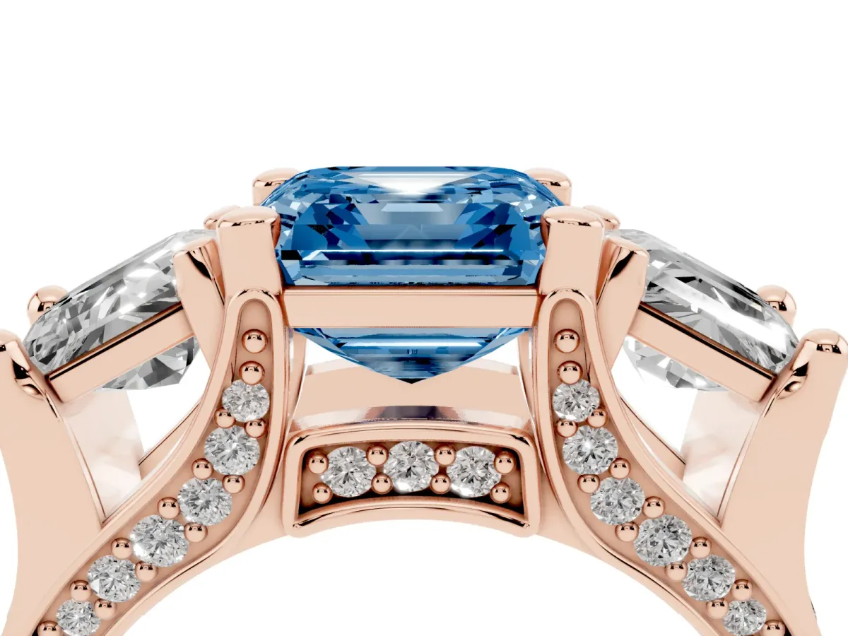 Fancy Blue Asscher Cut Diamond Three-Stone Ring with Channel Set Band and Four-Prong Setting Rose gold