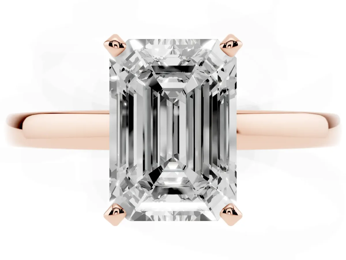 Emerald Cut Solitaire Diamond Engagement Ring with Four-Prong Setting on a Classic Band Rose gold