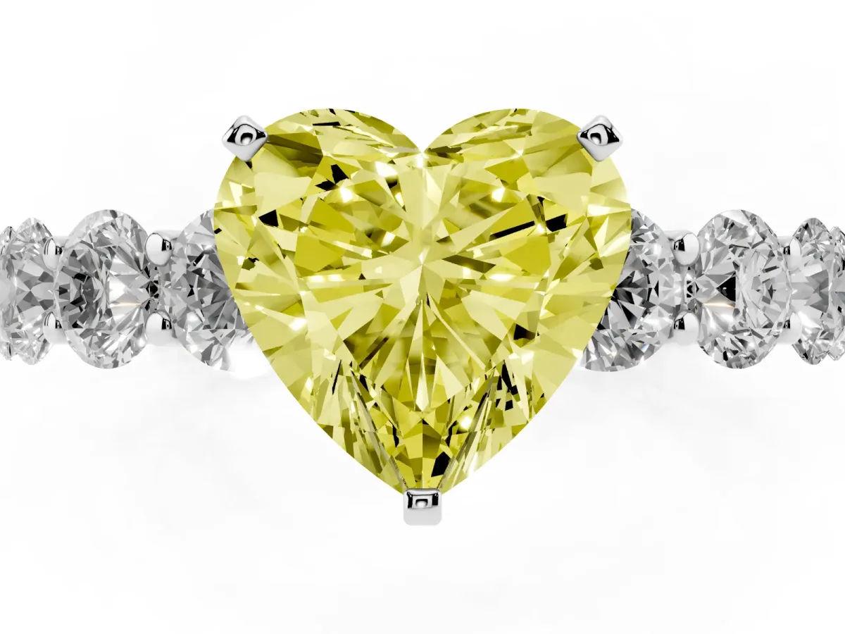 Fancy Yellow Heart Cut Diamond Prong Setting with Side Stones on a Pave Band Silver