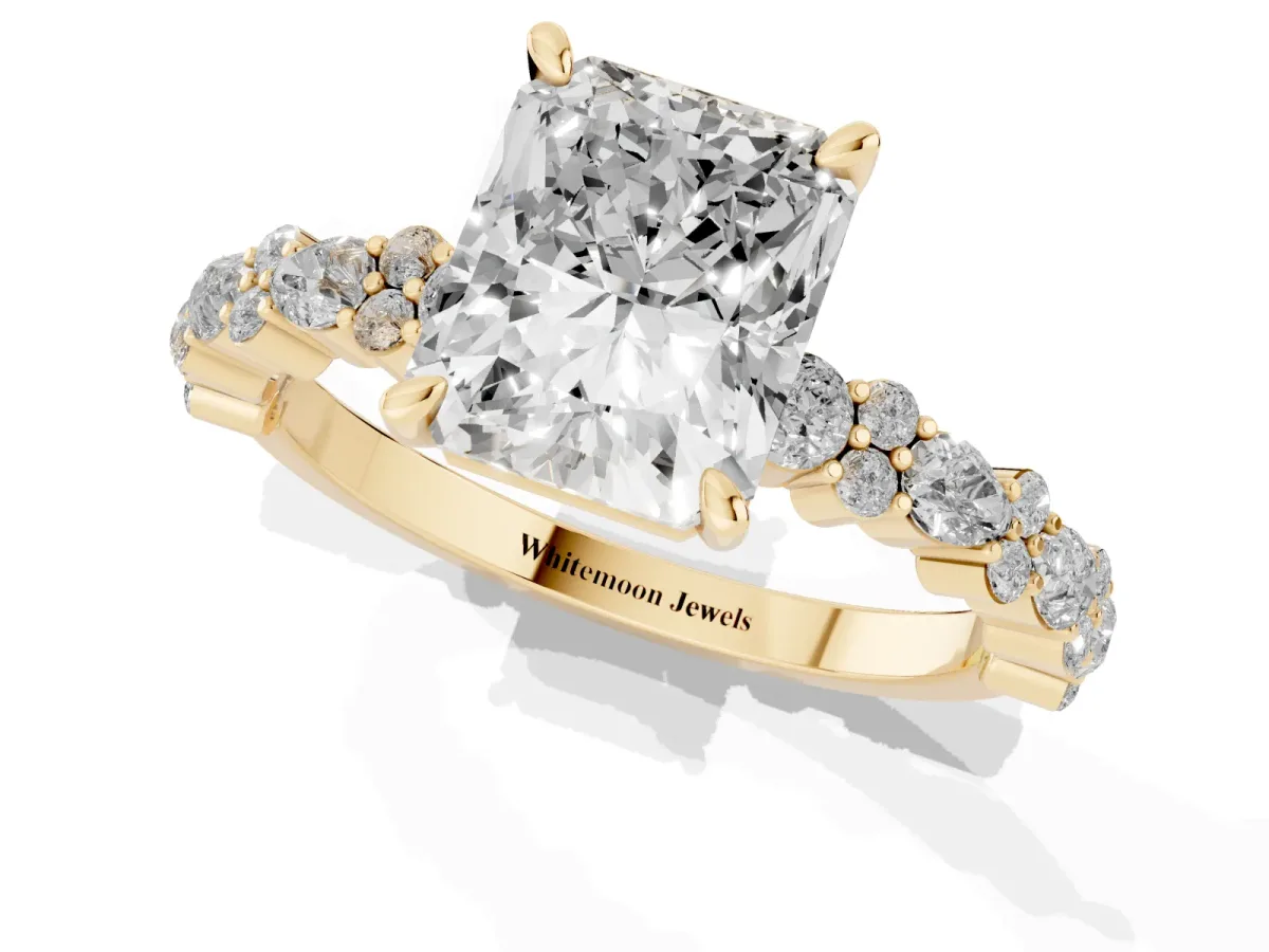 Radiant Cut Diamond Side Stone Solitaire Ring with Round and Four-Prong Setting Yellow gold