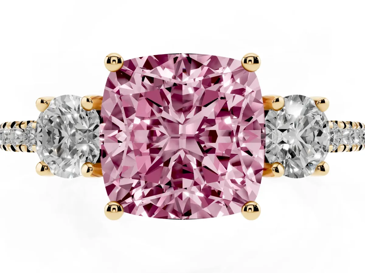 Fancy Pink Three-Stone Cushion Cut Cut Diamond Pavé Band with Prong Setting Yellow gold