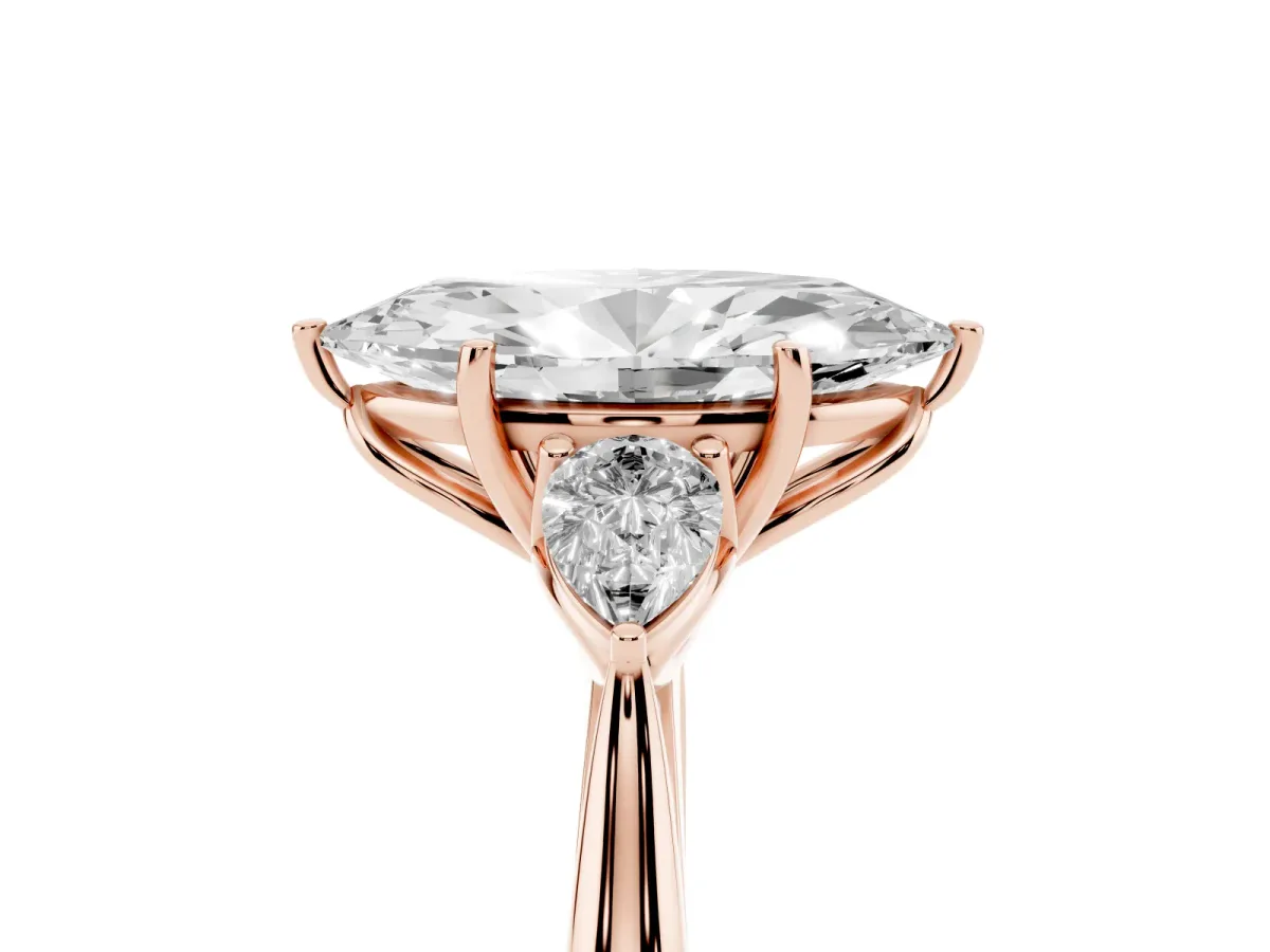 Three-Stone Marquise Cut Brilliant Diamond Solitaire Ring with Tapered Band and Four-Prong Setting Rose gold