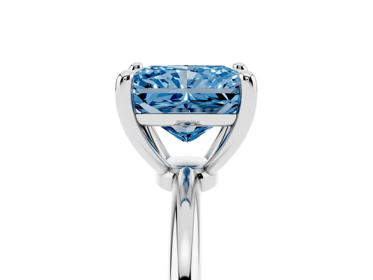 Fancy Blue Radiant Cut Solitaire Diamond Ring with 4-Prong Setting on a Classic Band Silver