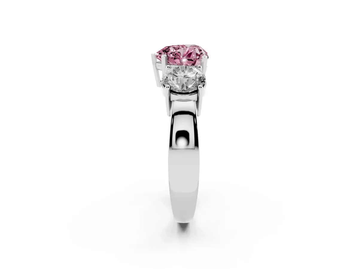 Fancy Pink Three-Stone Heart Cut Diamond Ring with Round Side Stones, Classic Band, and Four-Prong Setting Silver