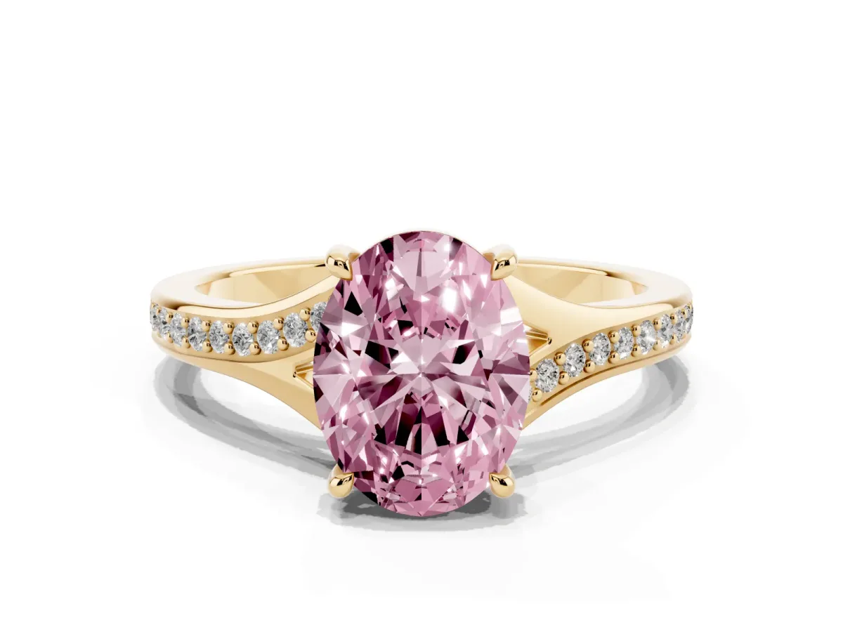 Fancy Pink Oval Cut Diamond Solitaire Ring with Pavé Band and Prong Setting Yellow gold