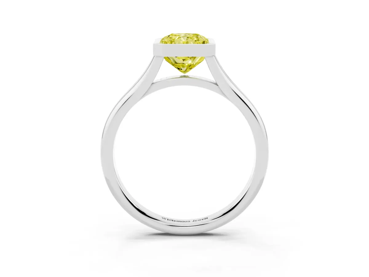 Fancy Yellow Bezel Set Radiant Cut Cut Solitaire Ring with Tapered Band Platinum