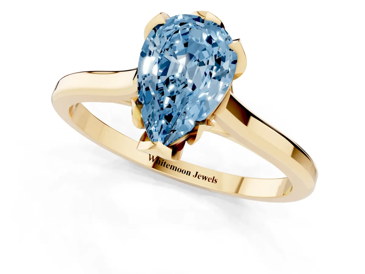 Fancy Blue Pear Cut Diamond Solitaire Ring with Flower Prong Setting and Classic Band Yellow gold