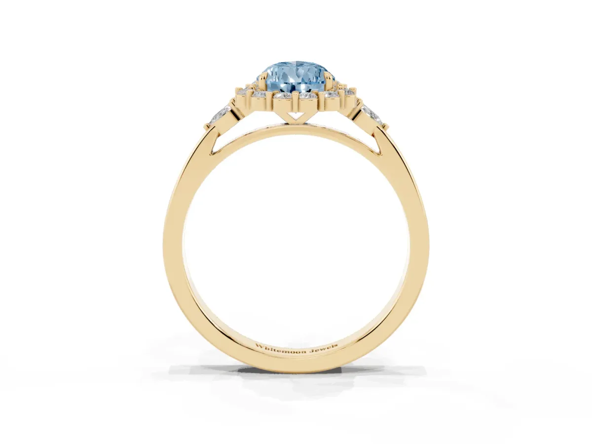 Fancy Blue Pear Cut Diamond Halo Ring with Pear Side Stones and Prong Setting Yellow gold