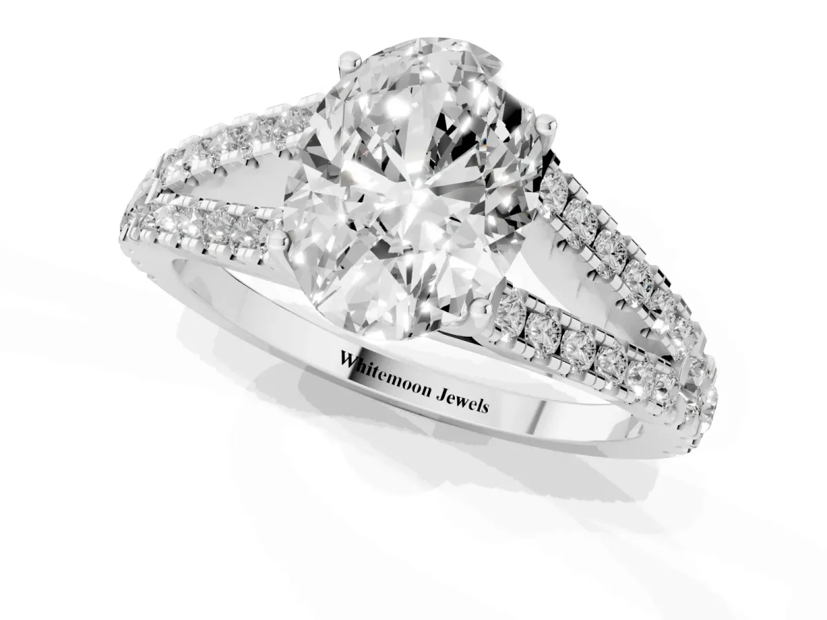 Oval Cut Diamond Split Shank Engagement Ring with Round Pavé and Prong Setting Platinum