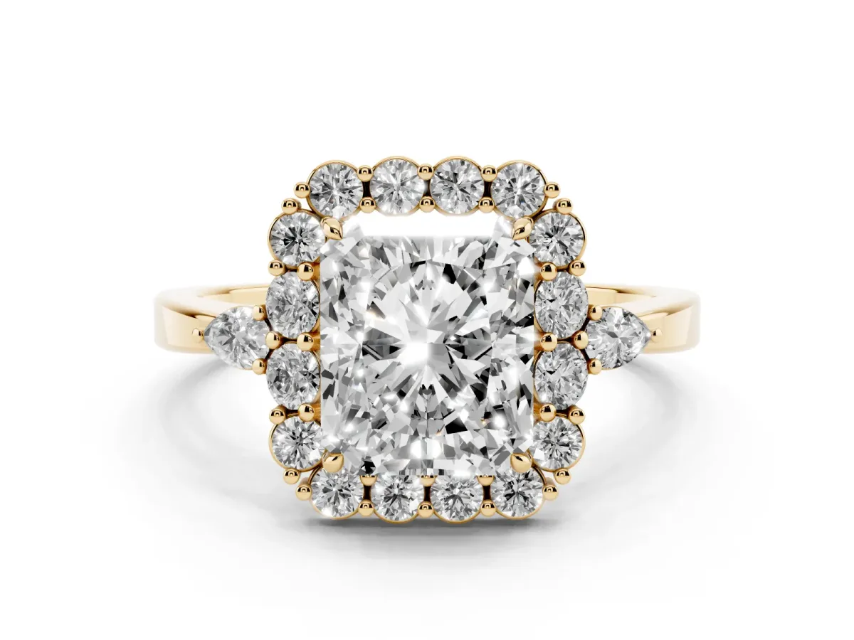 Radiant Cut Diamond Halo Ring with Pear Side Stones and Prong Setting Yellow gold