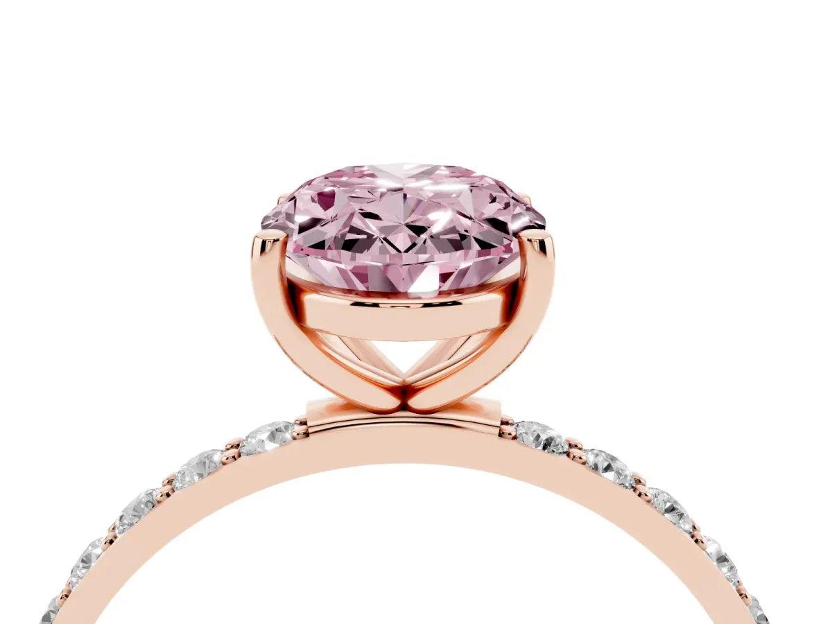 Fancy Pink Oval Cut Diamond Solitaire Ring with Round Pavé Shoulders and Prong Setting Rose gold