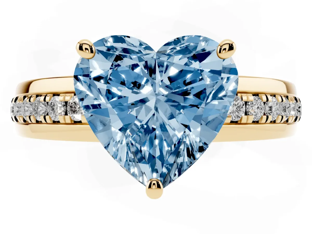 Fancy Blue Heart Cut Solitaire Diamond Ring with Channel Set Band and Six-Prong Setting Yellow gold