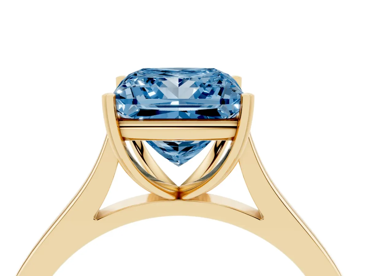 Fancy Blue Princess Cut Solitaire Heart Prong Engagement Ring with Tapered Band Yellow gold